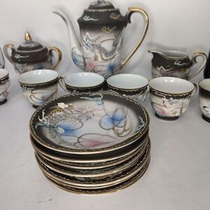 A teaset of Japanese Moriage dragon‎ ware.
